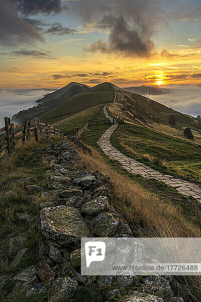 Path leading towards The Great Ridge with cloud inversion from Mam Tor  Peak District National Park  Derbyshire  England  United Kingdom  Europe