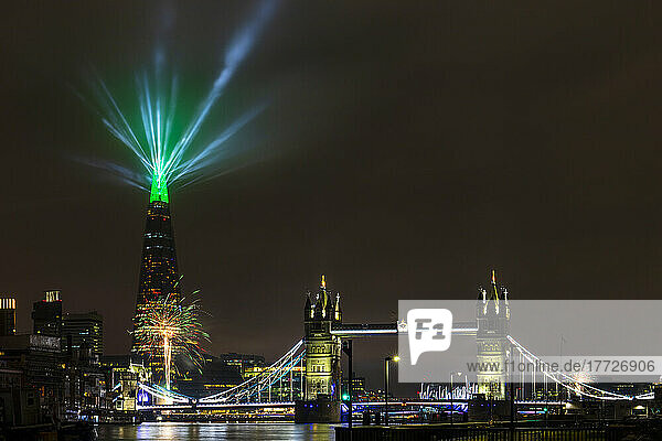 New Year 2022 firework and light display by The Shard and Tower Bridge  London  England  United Kingdom  Europe