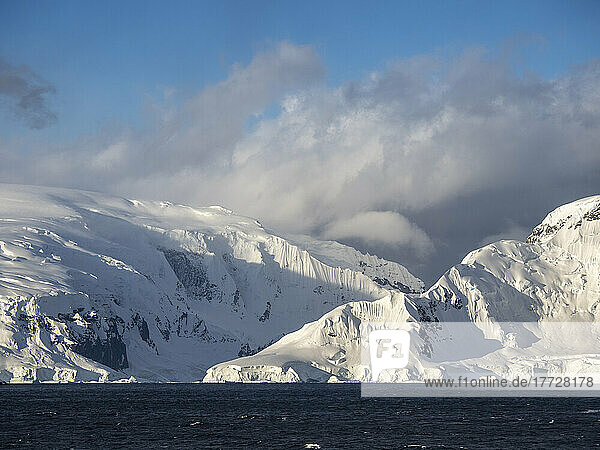 Snow-covered mountains on Danco Island  in front of the Antarctic Peninsula  Antarctica  Polar Regions
