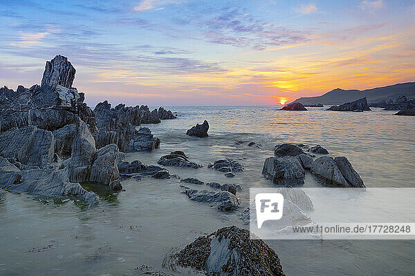 Sunset over Atlantic  Combesgate Beach  Woolacombe  Devon  England  United Kingdom  Europe