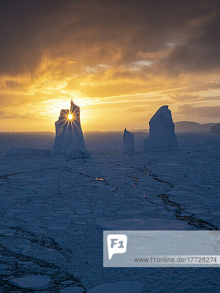 Sunset over an unusual iceberg near Petermann Island  Antarctica  Polar Regions
