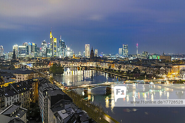 Lights of the Skyline of Frankfurt business district reflected in River Main at dusk  Frankfurt am Main  Hesse  Germany Europe