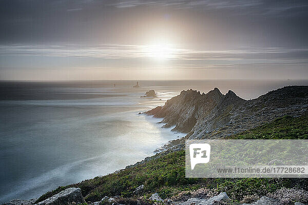 Sunset long exposure at Pointe du Raz promontory  Finistere  Brittany  France  Europe