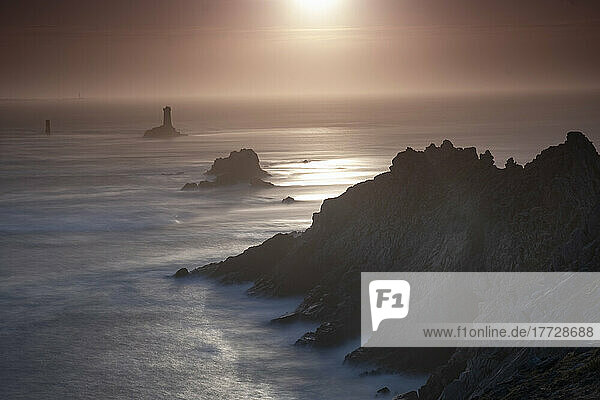 Sunset long exposure at Pointe du Raz promontory  Finistere  Brittany  France  Europe