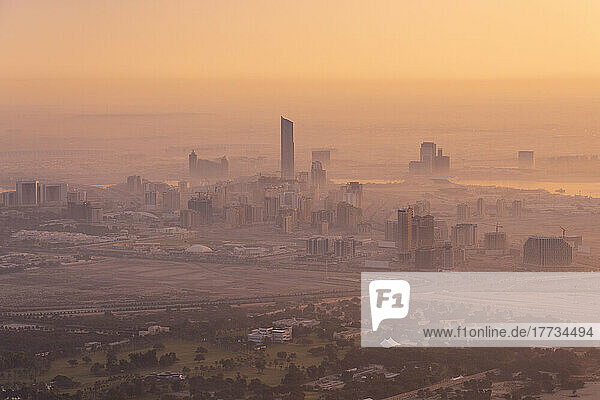 United Arab Emirates  Dubai  View of city at foggy dawn