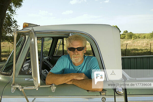Man in pick-up truck