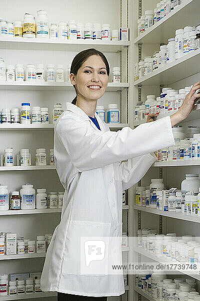 Portrait of female pharmacist in pharmacy