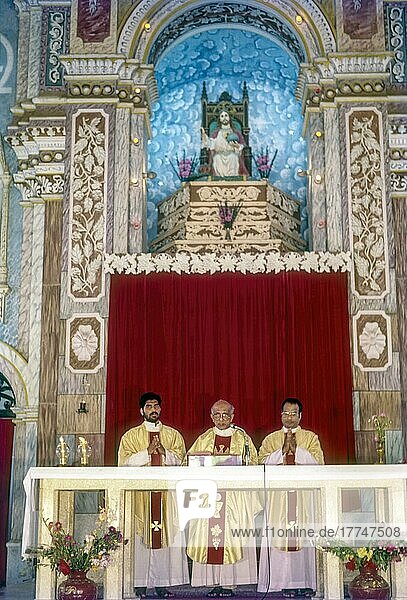 Priest preaching Santa Cruz Basilica in Fort Kochi  Kerala  India  Asia