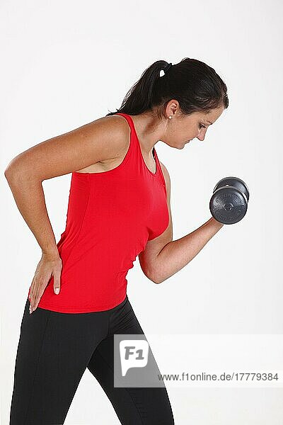 Woman exercising with a dumbbell