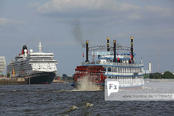 Paddle steamer Louisiana Star and cruise ship Queen Elizabeth  Port of Hamburg  Hamburg  Germany  Europe