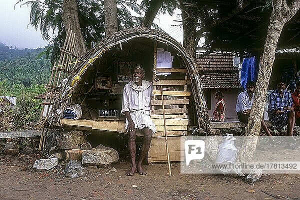 An old man sitting in a hut  Kerala  India  Asia