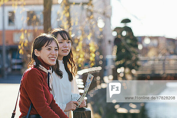Young Japanese women enjoying a trip together