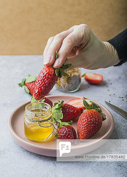 Fresh strawberries with honey and propolis