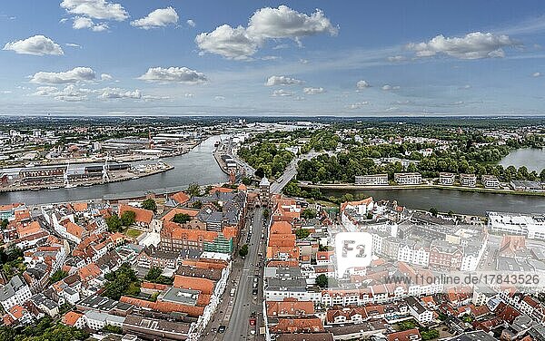 Drone shot  drone photo  panorama photo  historical city centre of Lübeck with view of the castle with the castle gate  European Hanseatic Museum  the river Trave and the harbour  Lübeck  Schleswig-Holstein  Germany  Europe