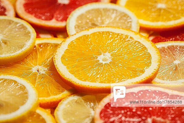 Bunte Zitrusfrüchte  Zitrone  Orange  Grapefruit  Scheiben Hintergrund