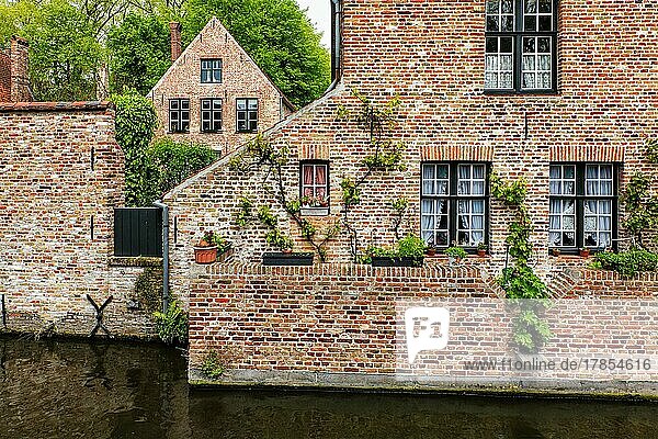 Medieval brick houses in Bruges (Brugge) along the canal. Belgium