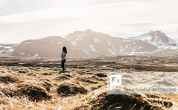 woman meditating in the landscapes of iceland