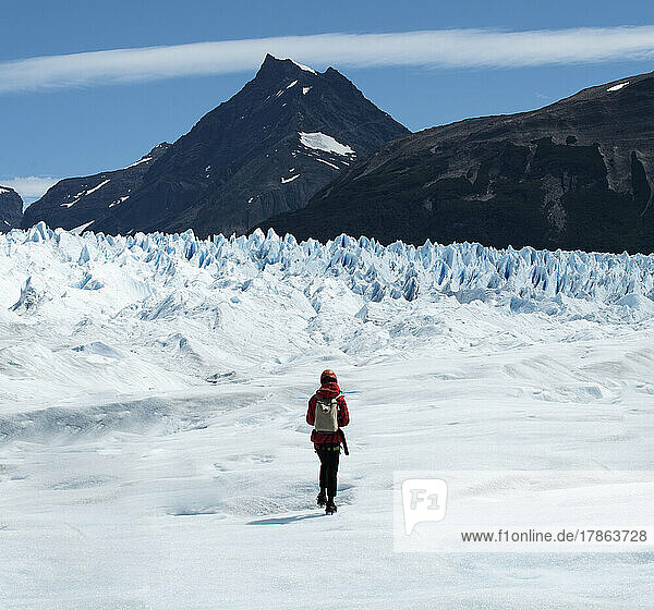 A hiker wanders around the massive landscape of the Perito Moren