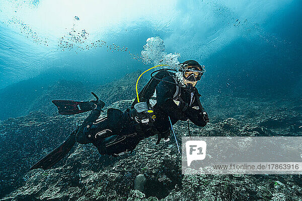diver in the tropical waters of the Andaman Sea in Thailand