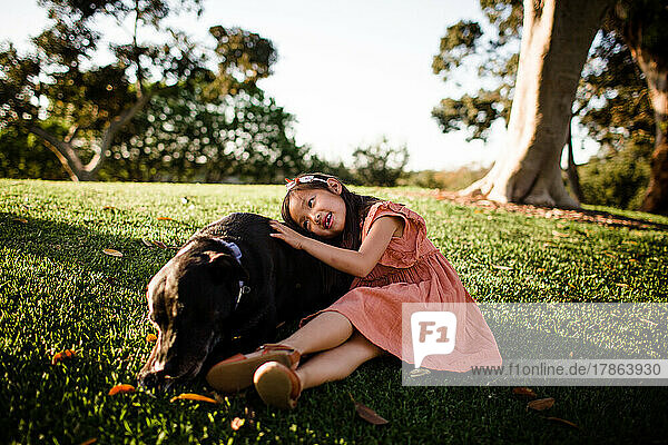 Portrait of Young Girl & Her Dog at Park in San Diego