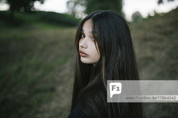 cute gothic long haired brunette woman
