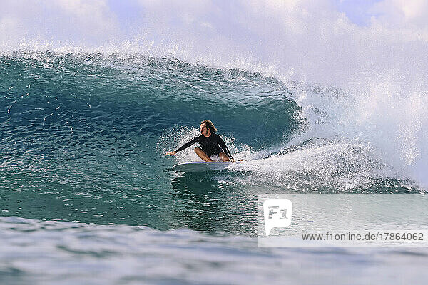 Male surfer on a wave  Maldives