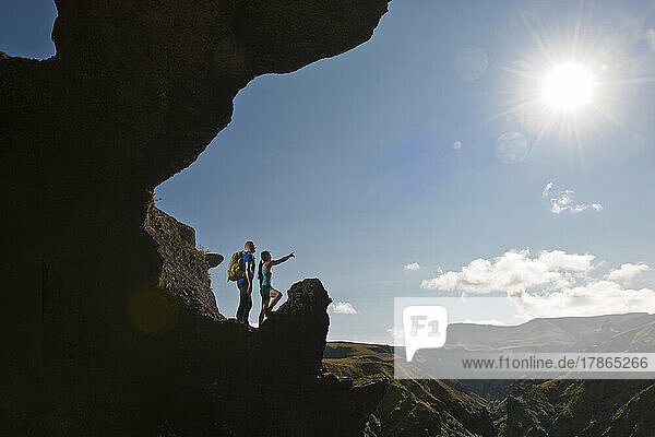 couple hiking in the Thorsmork valley in Iceland