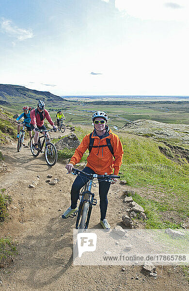 friends cycling up to the geothermal hot spring area Rekjadalur