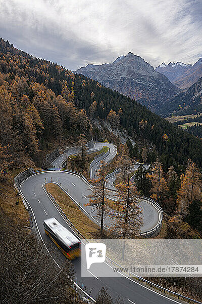 Switzerland  Grisons  Sankt Moritz  Bus driving along Maloja Pass road