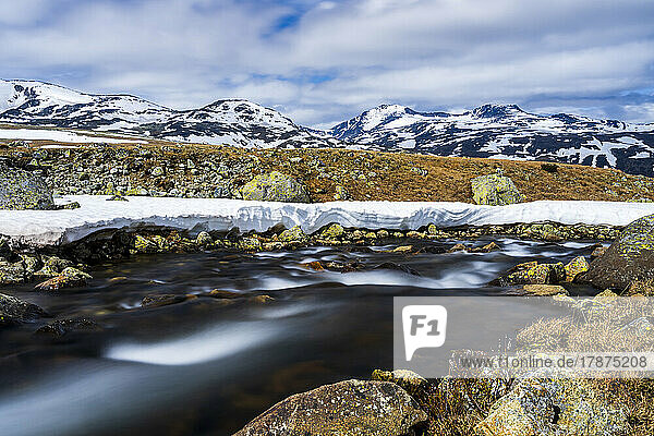 Norway  Innlandet  Long exposure of river flowing in Jotunheimen National Park