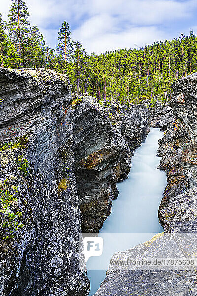 Norway  Innlandet  Long exposure of river Sjoa flowing through Ridderspranget ravine in Jotunheimen National Park