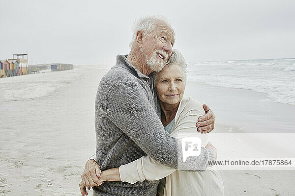 Senior couple embracing at the sea