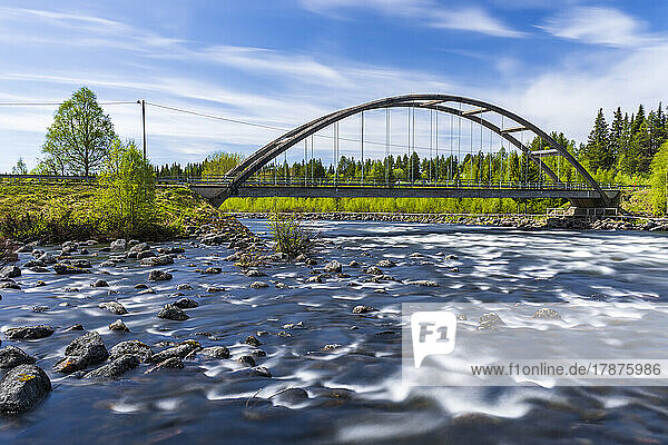Sweden  Norrbotten County  River Slagnas and Burmabron bridge in summer