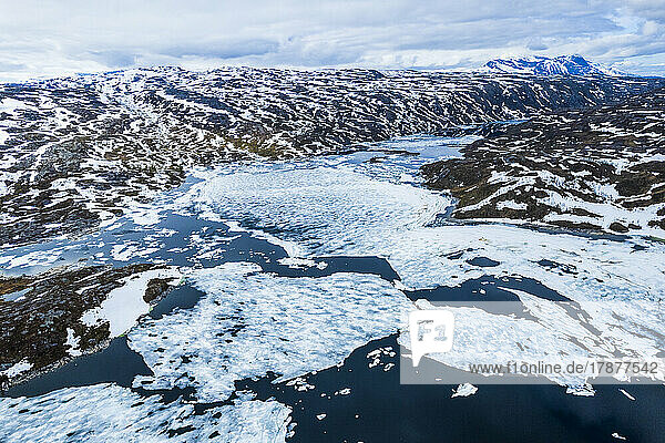 Norway  Nordland  Drone view of icy lake in Store Haugfjell range