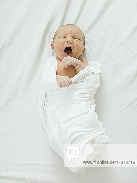 Yawning baby boy (0-1 months)