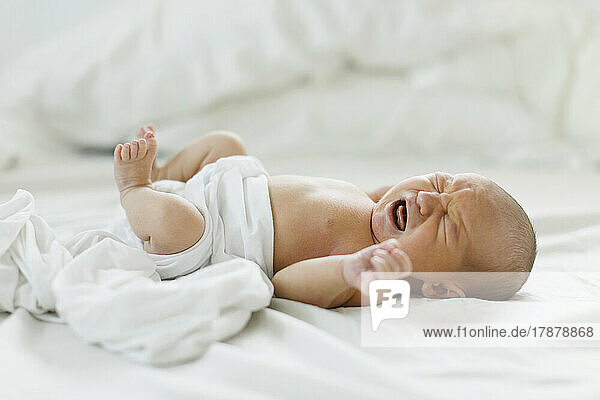 Newborn boy (0-1 months) crying