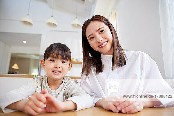 Japanese kid and mother at home