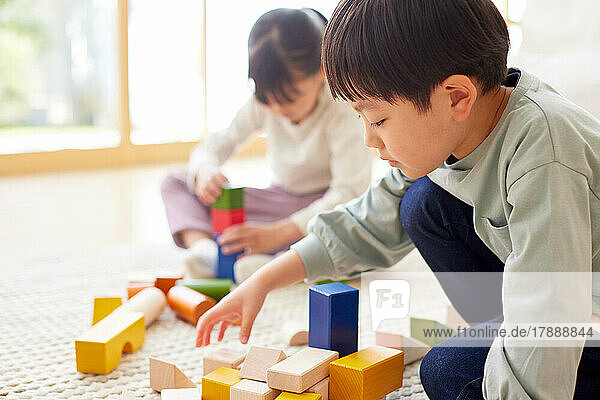 Japanese kids playing at home