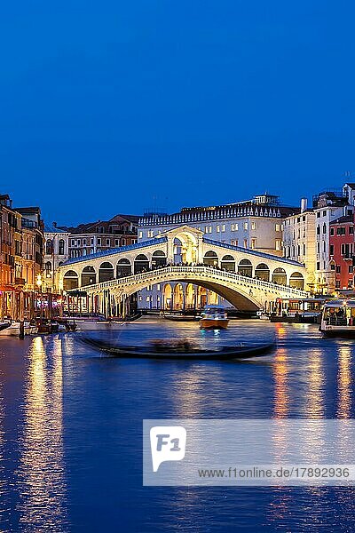 Rialto Bridge Rialto Bridge over Canal Grand with Gondola Holiday Travel City by Night in Venice  Italy  Europe