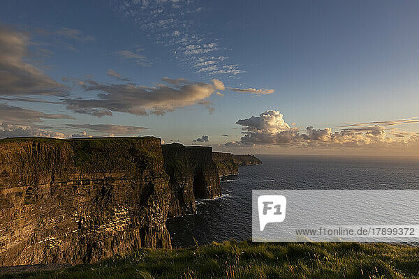 Cliffs of Moher by sea at sunset  Ireland