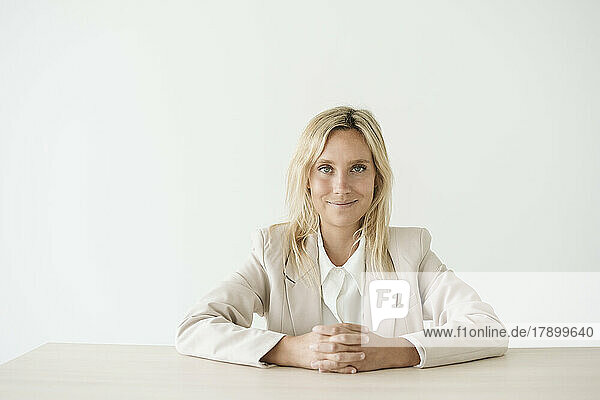 Portrait of a confident businesswoman at desk