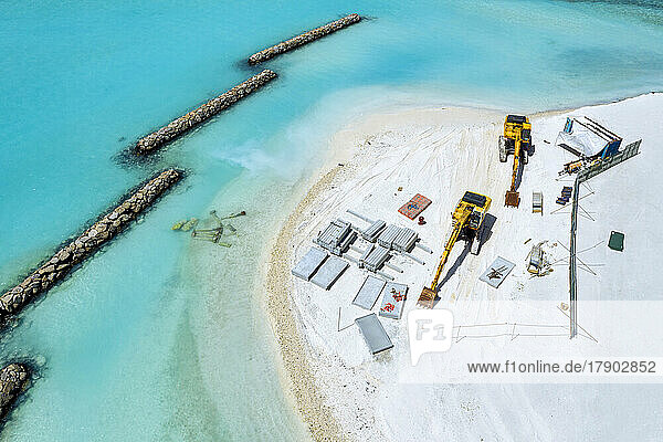 Maldives  Aerial view of construction site at edge of sandy beach