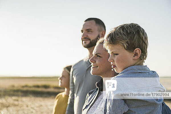 Confident family looking at distance