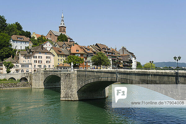 Germany  Baden-Wurttemberg  Laufenburg  Town on bank of river Rhine with arch bridge in foreground