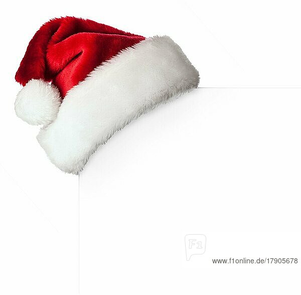 Weihnachtsmannmütze auf weißem Karton Poster