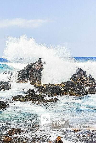 Sea waves hitting rocks near Hookipa Beach  Maui
