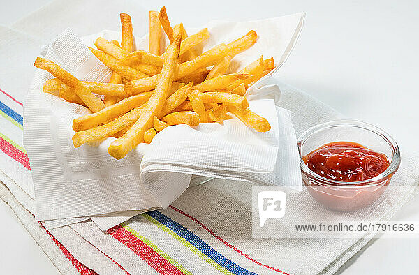 French fries with cup of ketchup