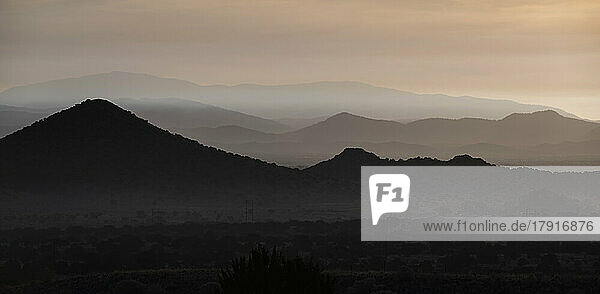 Usa  New Mexico  La Ceinega  Smoke covering early morning sky over Sangre de Cristo Mountains