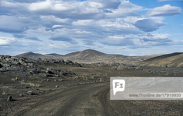 Track through black sand  volcanic landscape  barren landscape  Vatnajökull National Park  Icelandic Highlands  Iceland  Europe