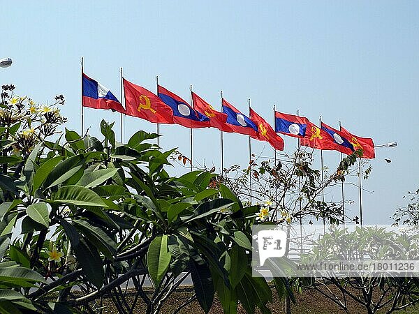 Flags on Mekong waterfront  Vientiane  Laos  Asia